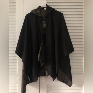 Rainraps, rain cape, os, black with camo print on the inside.